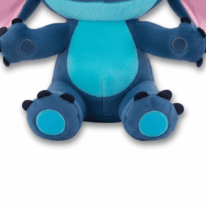 Grande peluche di Stitch blu in posa attiva sulle zampe.