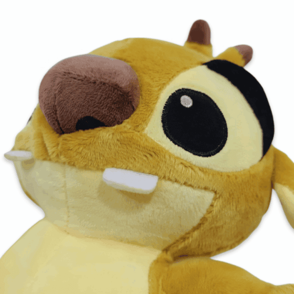 zoom volto peluche Reuben Stitch giallo